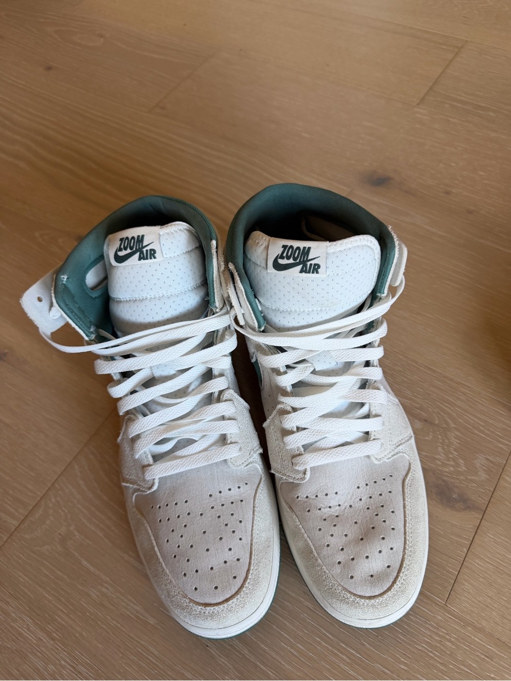 Jordan High-Top Sneakers in Off-White with green Accents